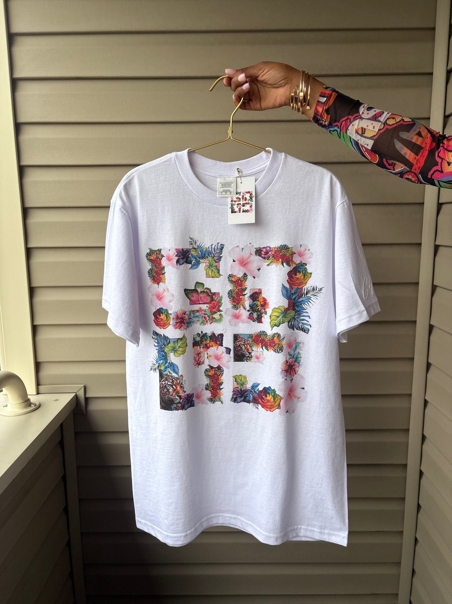 Custom floral t-shirt featuring vibrant floral design, perfect for casual or spring outfits