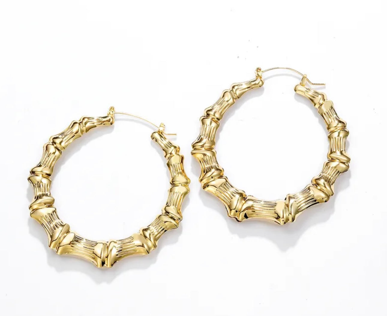 Classic bamboo earrings in gold with a unique textured design for a stylish look