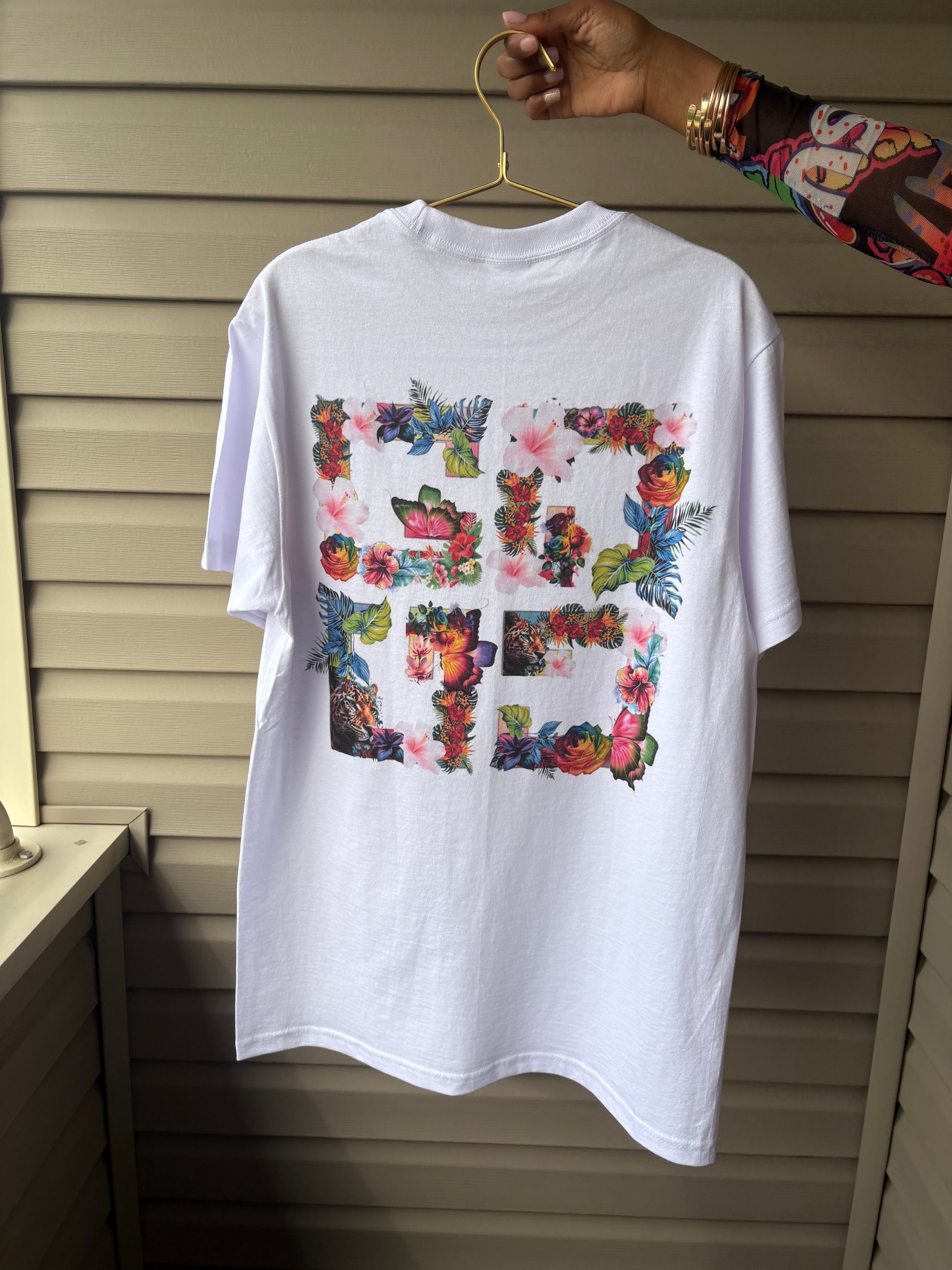 Custom floral t-shirt featuring colorful floral prints on the back for a stylish look