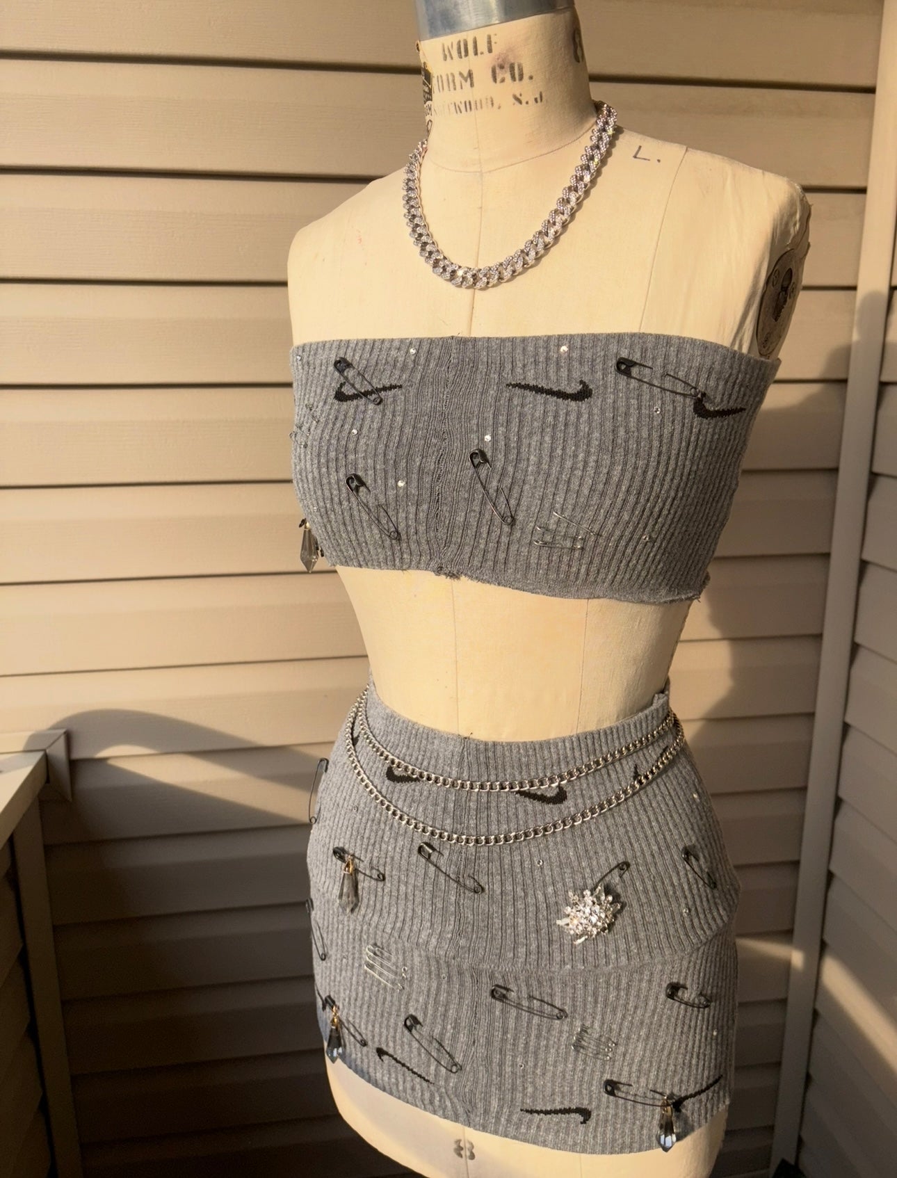 Custom Nike skirt set featuring a strapless top and fitted skirt with unique detailing