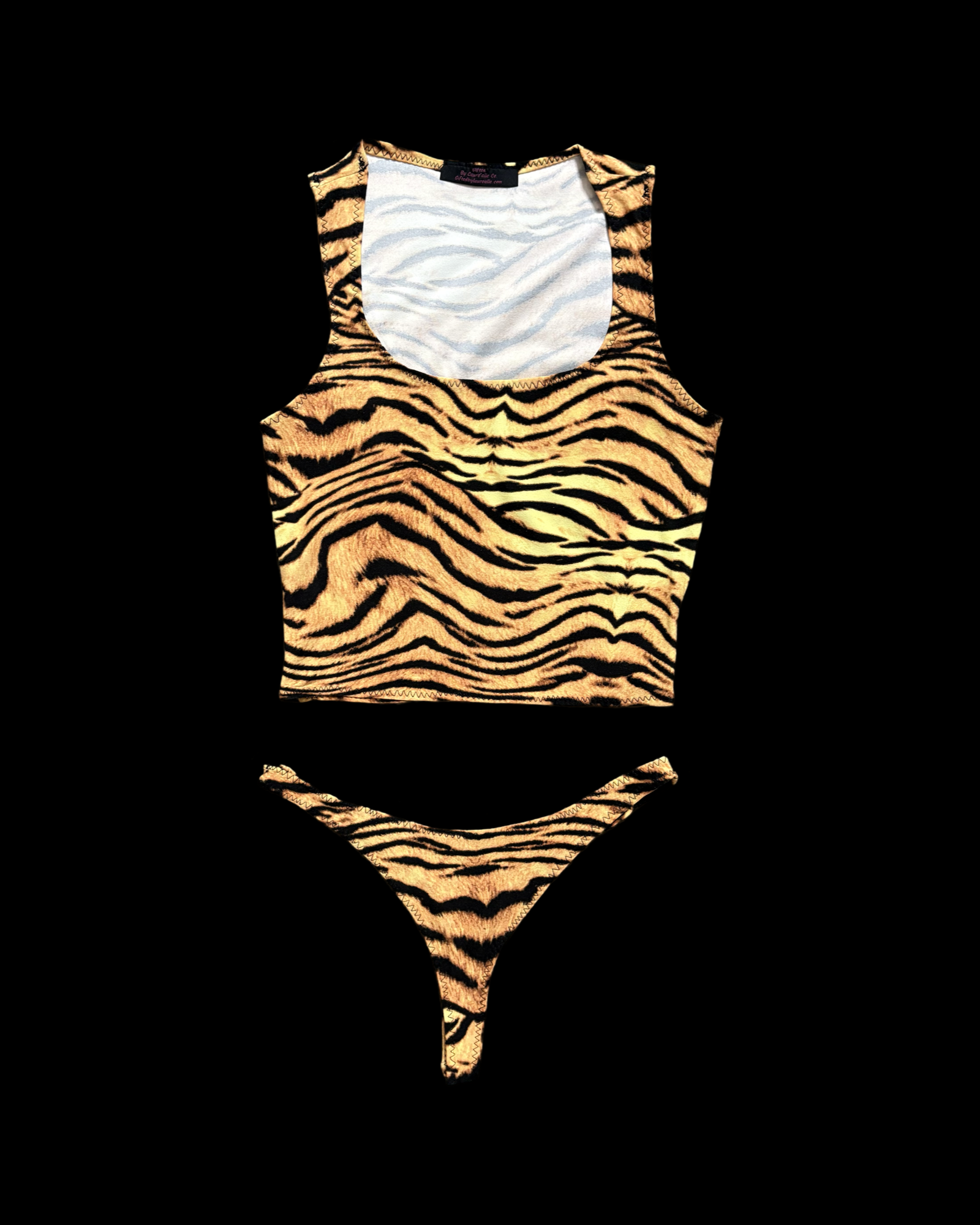 Tiger print loungewear set featuring a sleek crop top and matching thong for stylish comfort