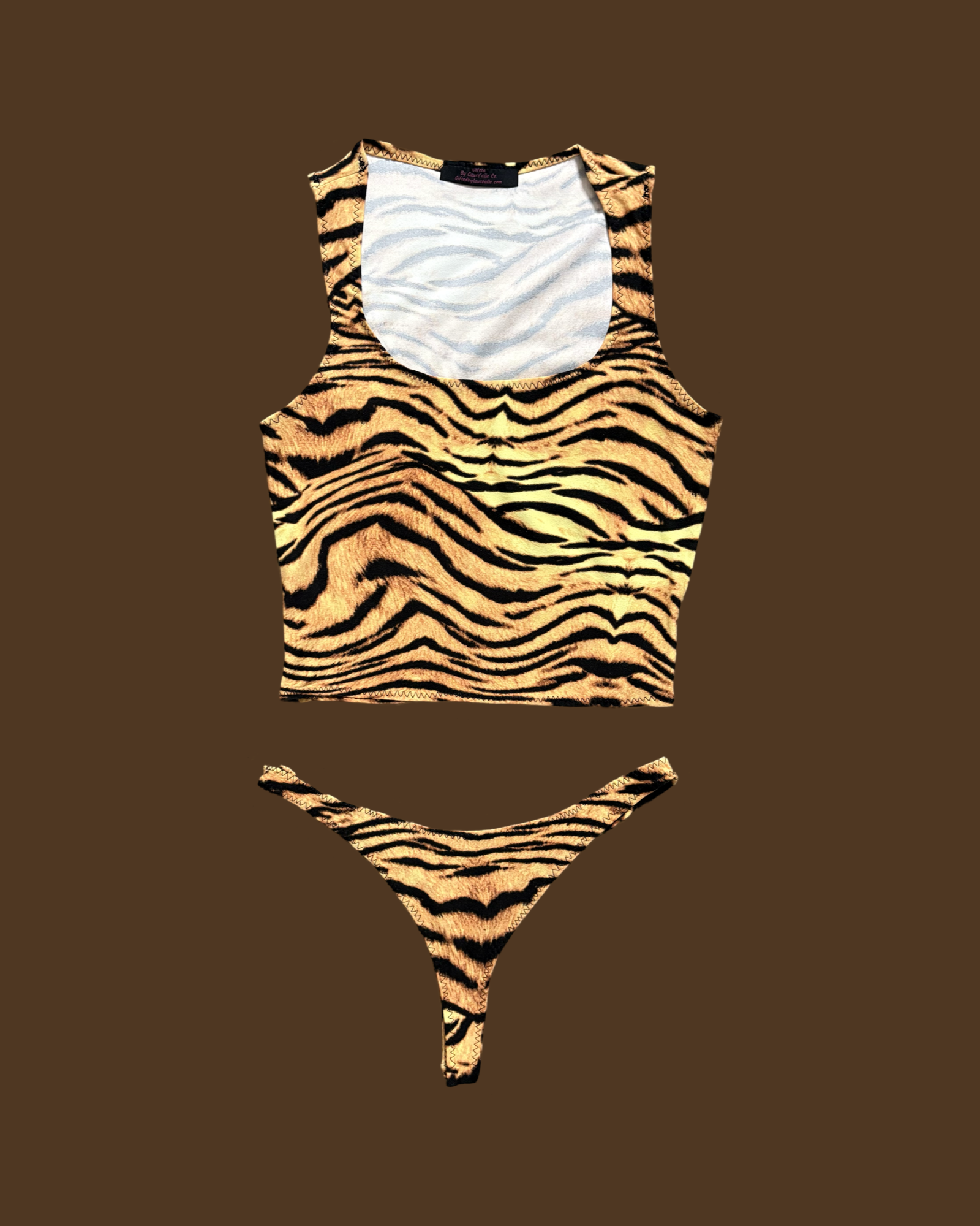 Tiger print loungewear set featuring a stylish crop top and matching thong for casual comfort