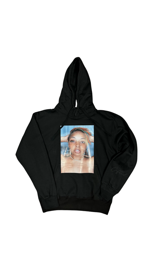 Unique fashion hoodie with artistic graphic design featuring a portrait on a black background