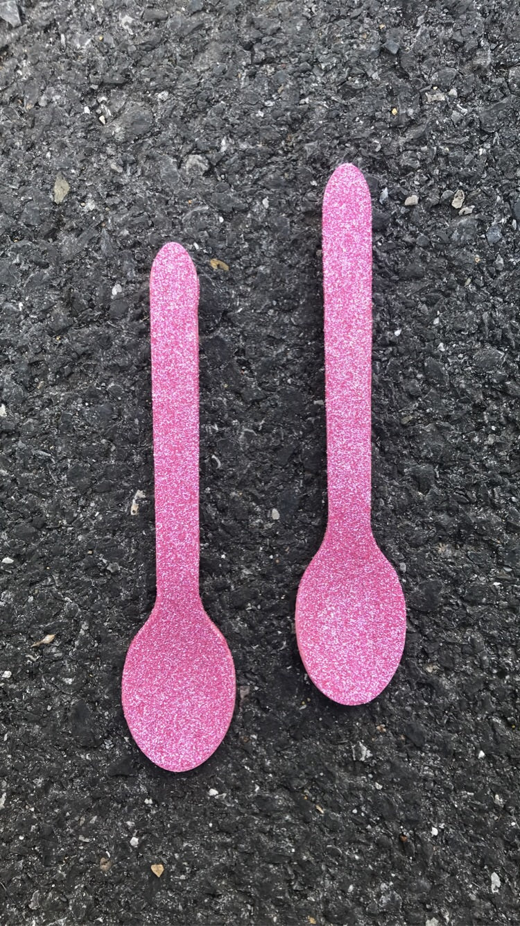 Pink glitter spoon earrings handcrafted by Gifted By Laure’alle & Co for a whimsical look